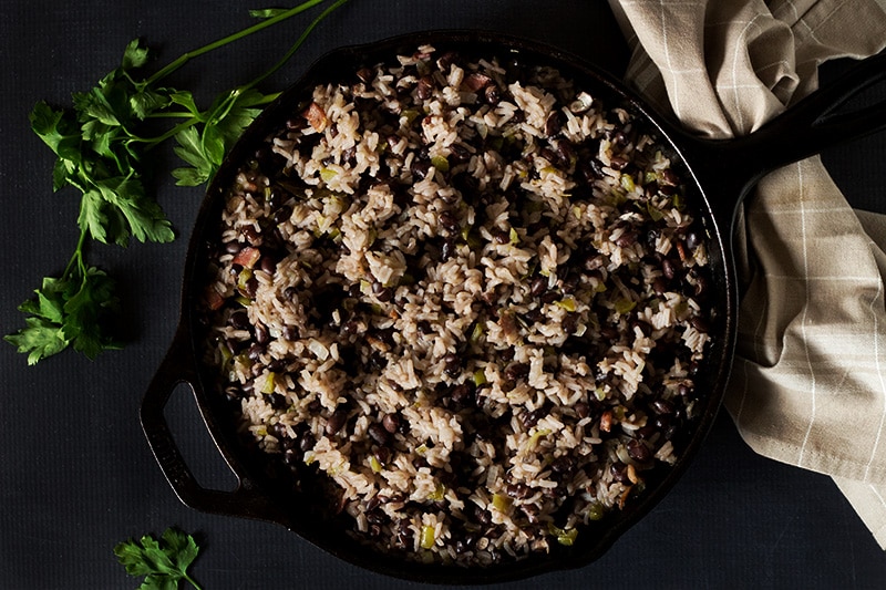 Classic Cuban black beans and rice dish called Moros Y Cristianos in Spanish. A perfect side dish! #cuba #rice | cookingtheglobe.com