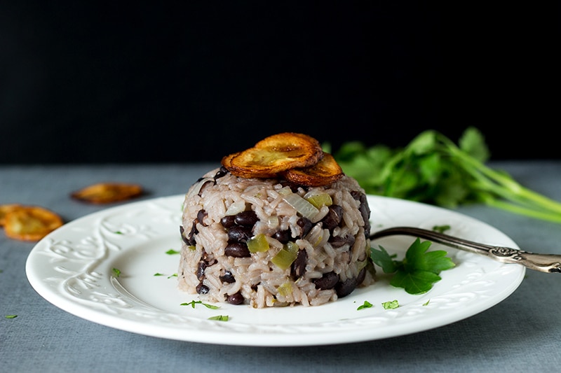 Classic Cuban black beans and rice dish called Moros Y Cristianos in Spanish. A perfect side dish! #cuba #rice | cookingtheglobe.com