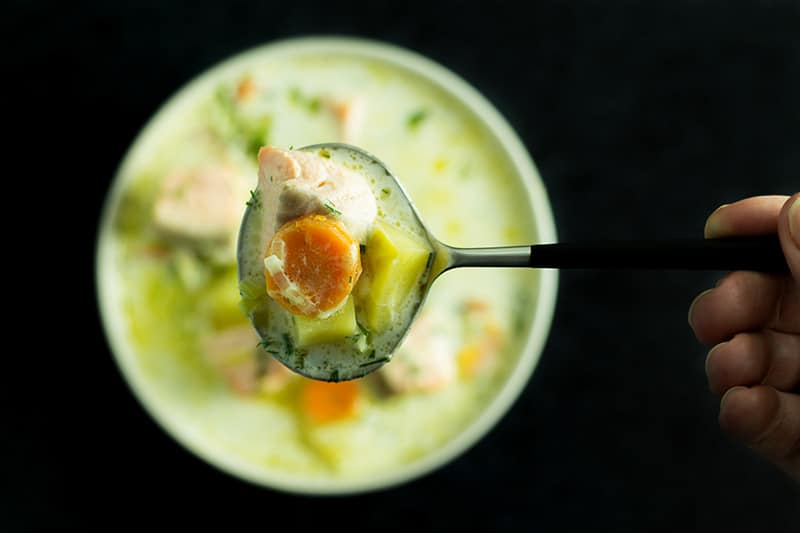 Hearty & creamy traditional Finnish Salmon Soup - Lohikeitto. Warms you up instantly and it's really filling! #Finland #soup #salmon | cookingtheglobe.com