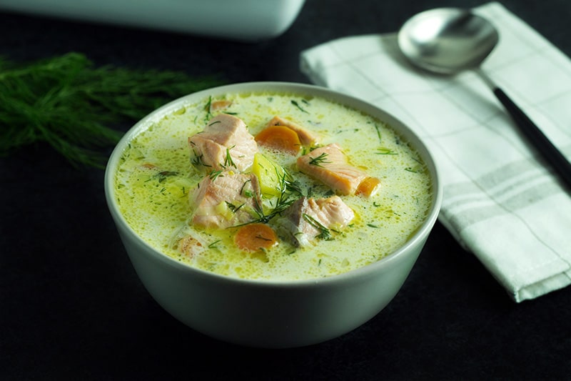 Hearty & creamy traditional Finnish Salmon Soup - Lohikeitto. Warms you up instantly and it's really filling! #Finland #soup #salmon | cookingtheglobe.com