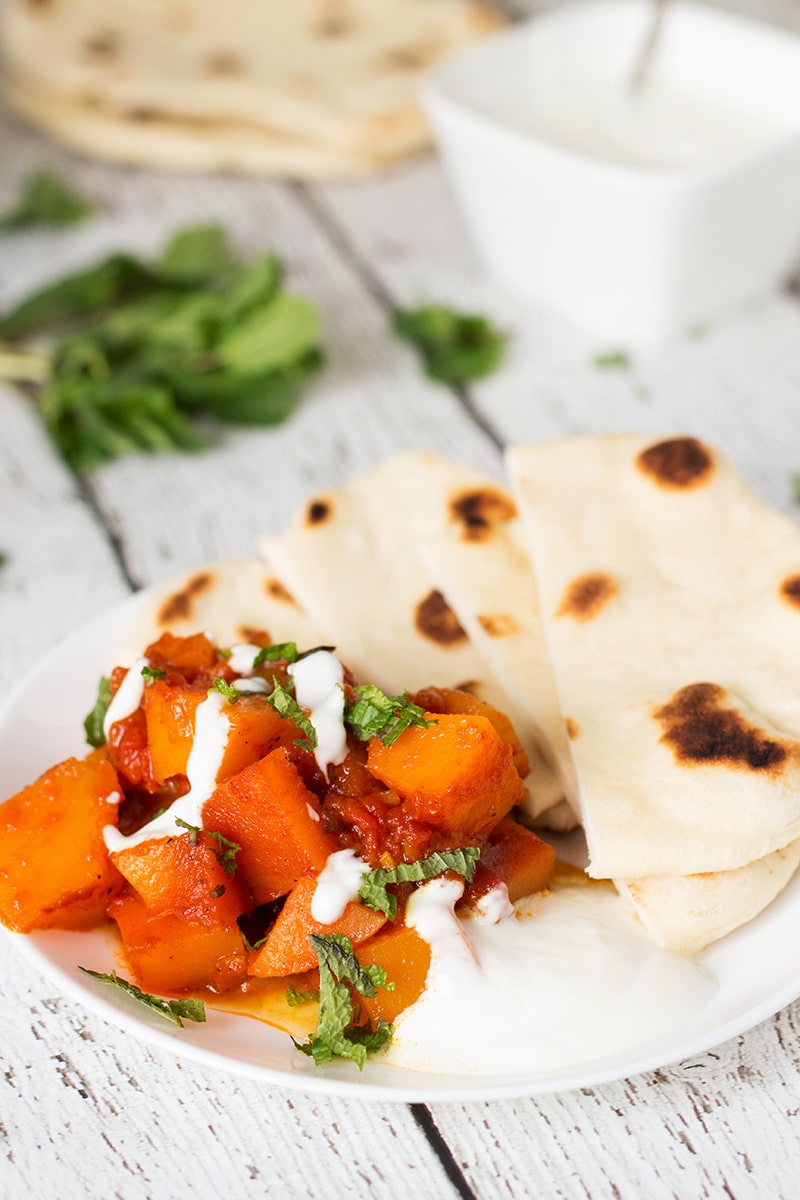 This sweet & savory Afghan pumpkin with yogurt-garlic sauce (Kadu Bouranee or Kadoo Borani) tastes fantastic and it's so easy to make! #Afghan #pumpkin | cookingtheglobe.com