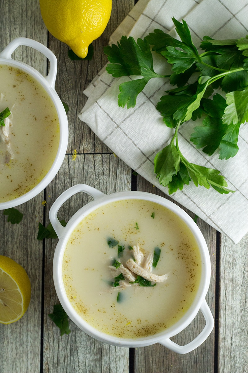This Greek lemon rice soup, called Avgolemono, is both light and creamy. It will brighten your day! #soup #lemon #chicken | cookingtheglobe.com