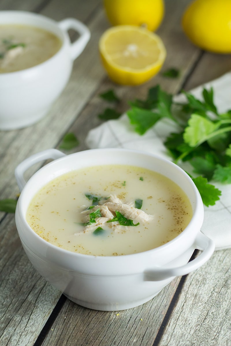 This Greek lemon rice soup, called Avgolemono, is both light and creamy. It will brighten your day! #soup #lemon #chicken | cookingtheglobe.com