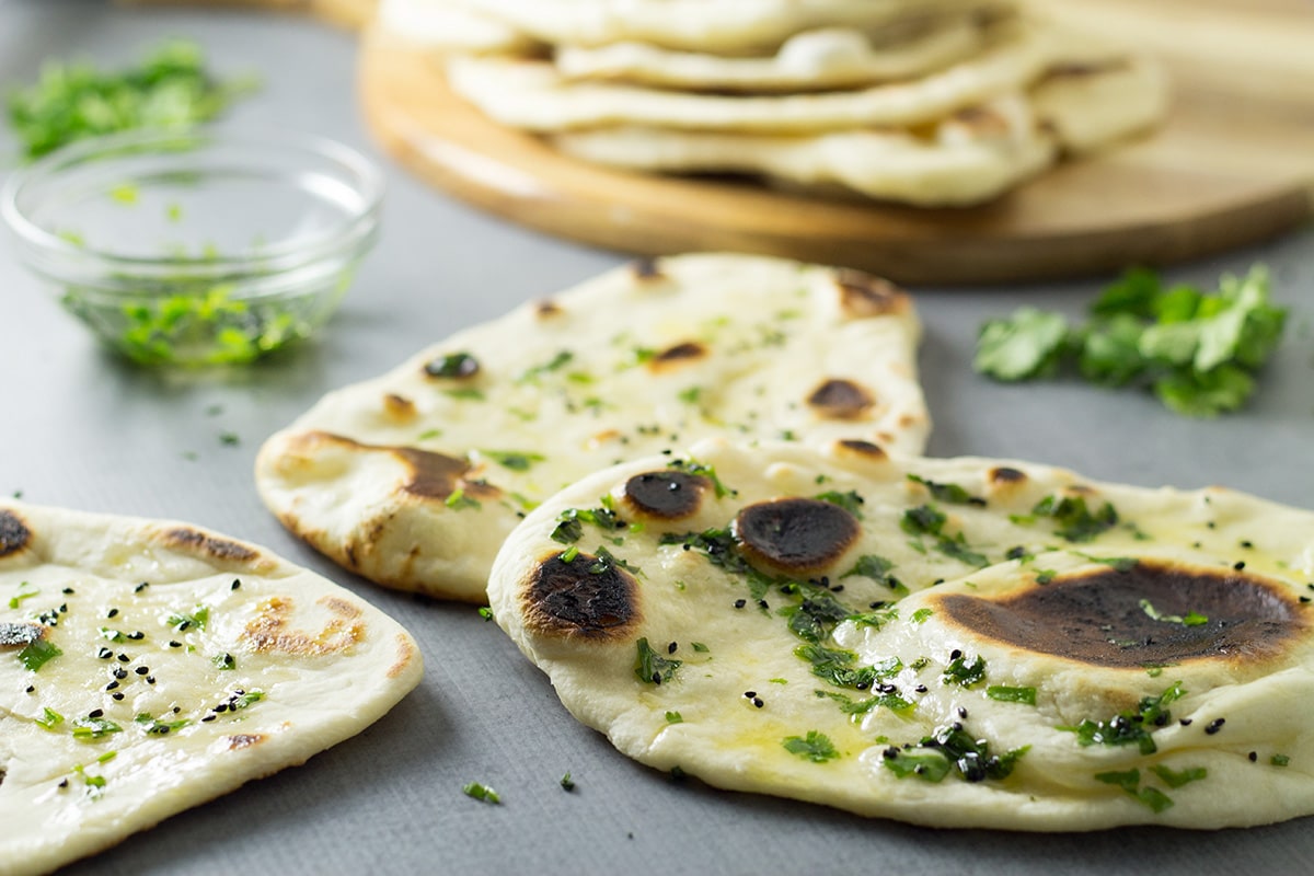 How to make Naan bread at home + authentic indian recipe #indian #bread | cookingtheglobe.com