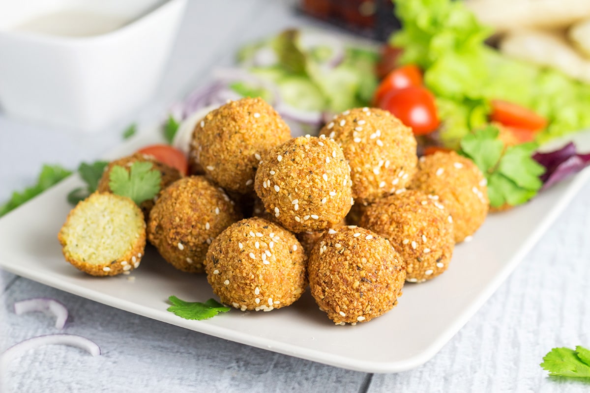 Wondering how to make falafel at home? Check out our comprehensive guide on this Middle Eastern appetizer + the authentic recipe! | cookingtheglobe.com