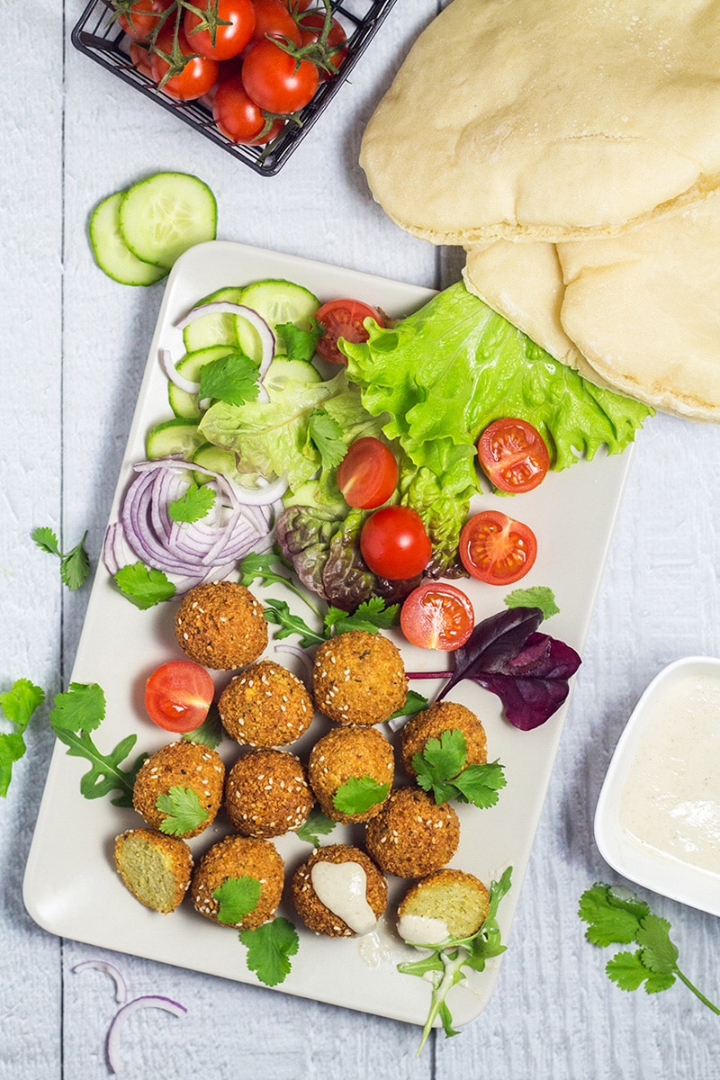 Wondering how to make falafel at home? Check out our comprehensive guide on this Middle Eastern appetizer + the authentic recipe! | cookingtheglobe.com