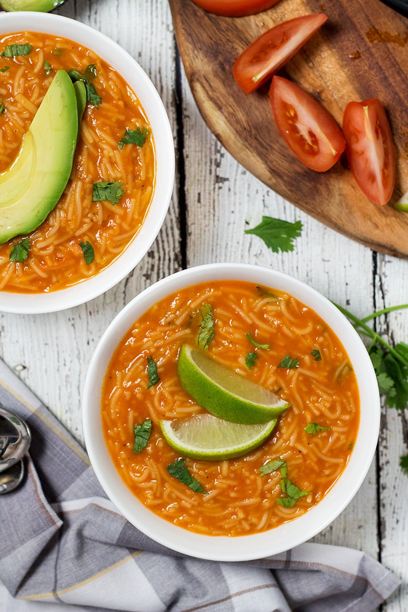 This hearty and comforting Mexican tomato noodle soup, called Sopa de Fideo, is a true feast of flavors! | cookingtheglobe.com