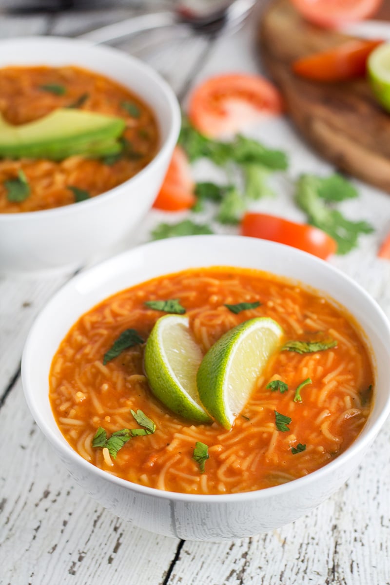 This hearty and comforting Mexican tomato noodle soup, called Sopa de Fideo, is a true feast of flavors! | cookingtheglobe.com