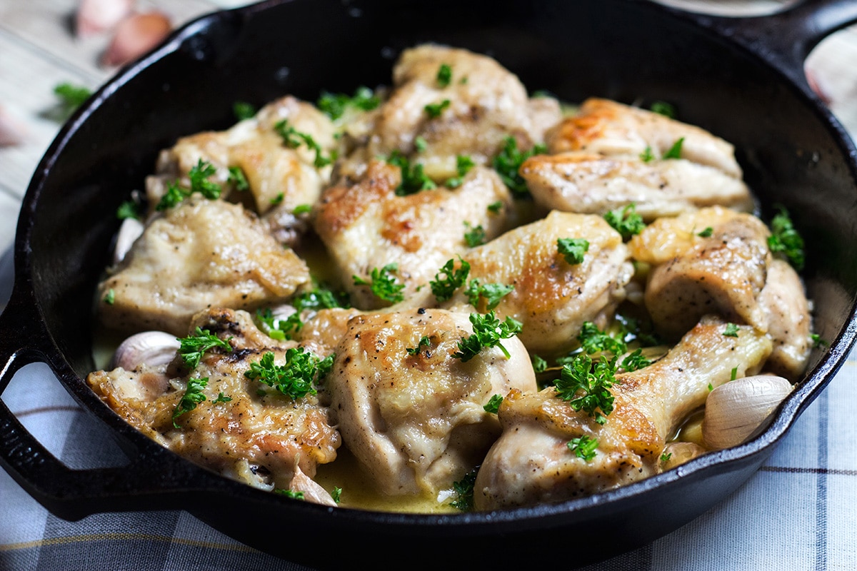 Pollo al Ajillo is a Spanish version of garlic chicken. This recipe requires only 7 ingredients to make! | cookingtheglobe.com