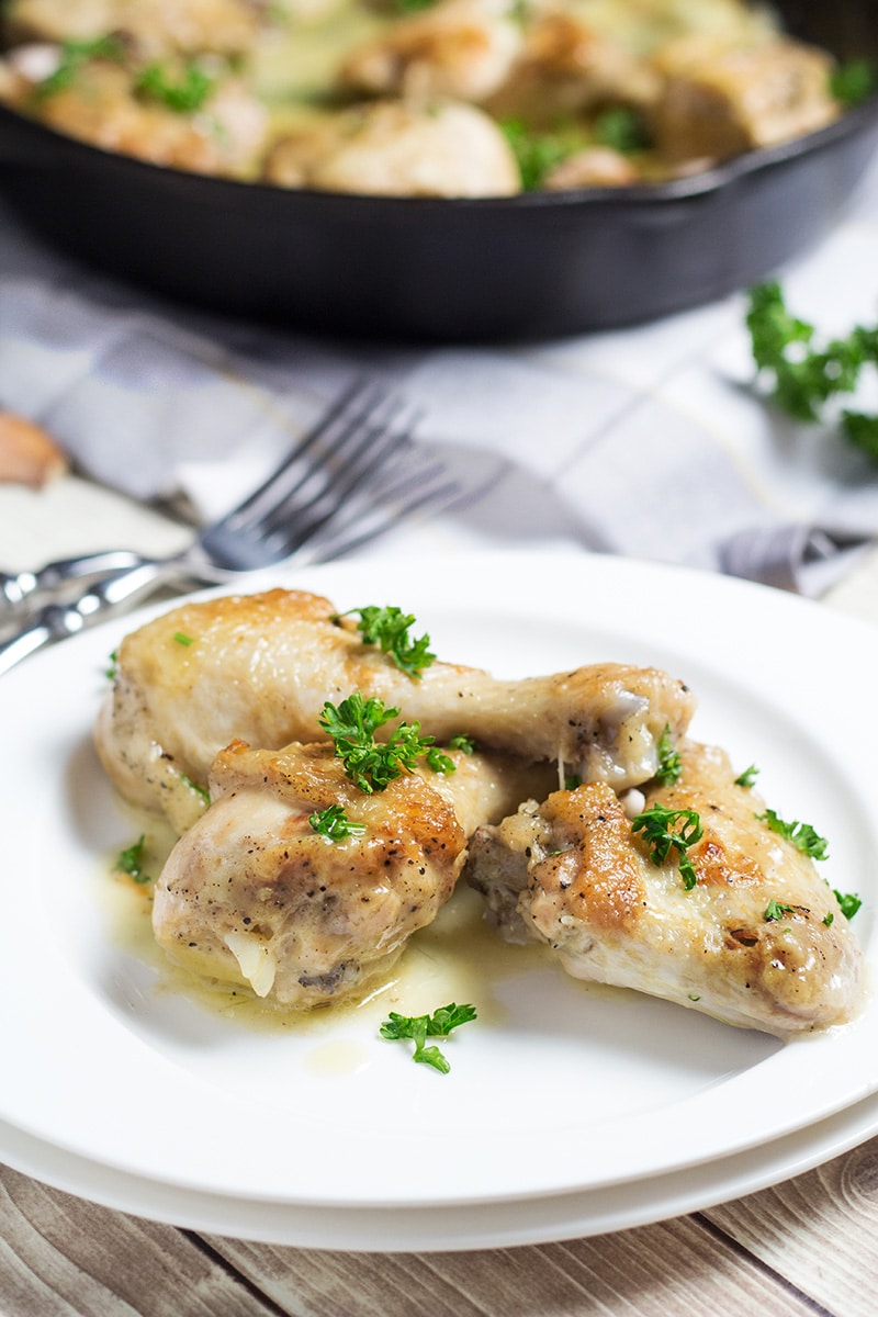 Pollo al Ajillo is a Spanish version of garlic chicken. This recipe requires only 7 ingredients to make! | cookingtheglobe.com