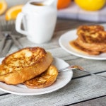 These sweet Spanish toasts, called Torijas, are soaked in milk and drizzled with an orange-brandy syrup! | cookingtheglobe.com