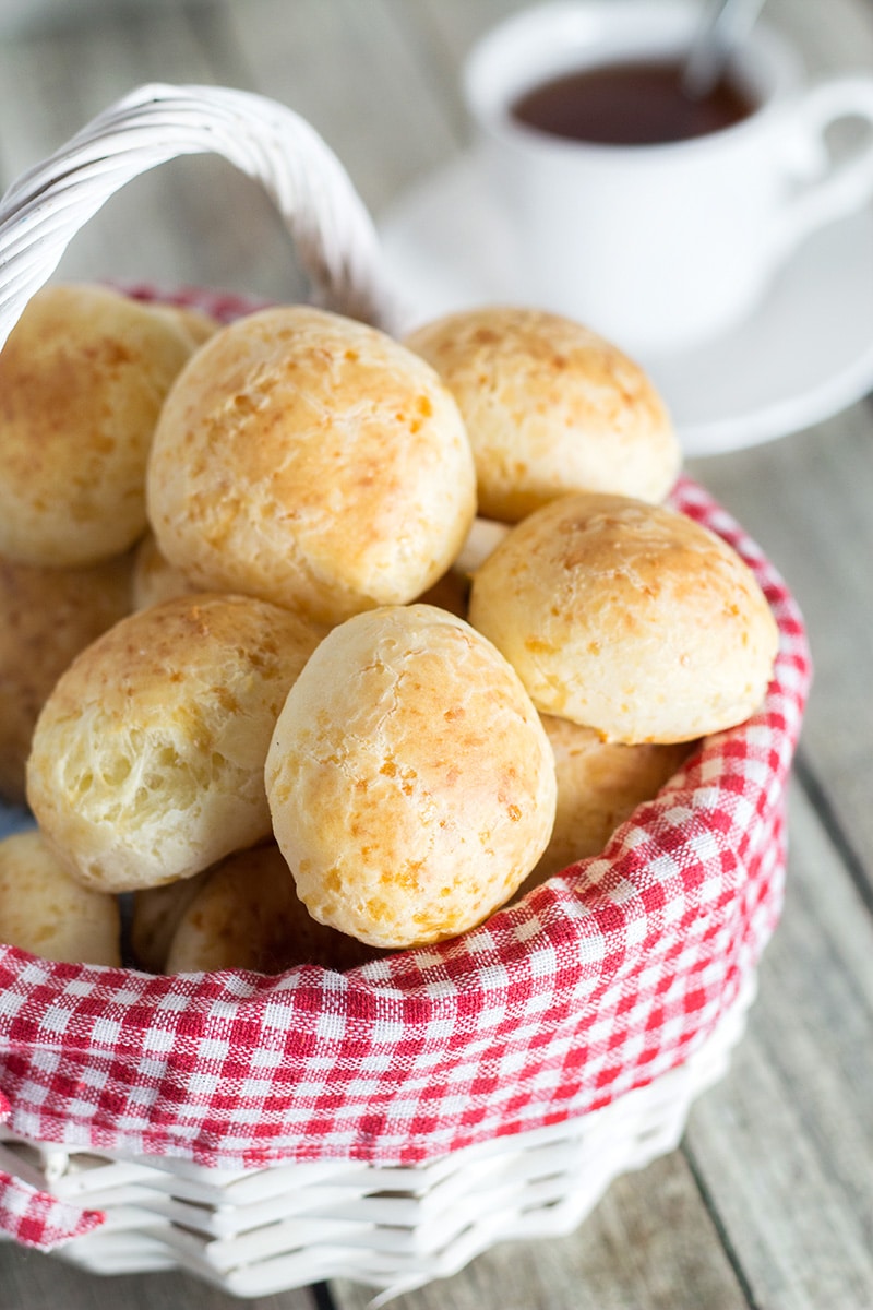 You will love this Pao de Queijo or Brazilian Cheese Bread recipe! The result is crispy outside but soft and chewy inside cheese puffs!