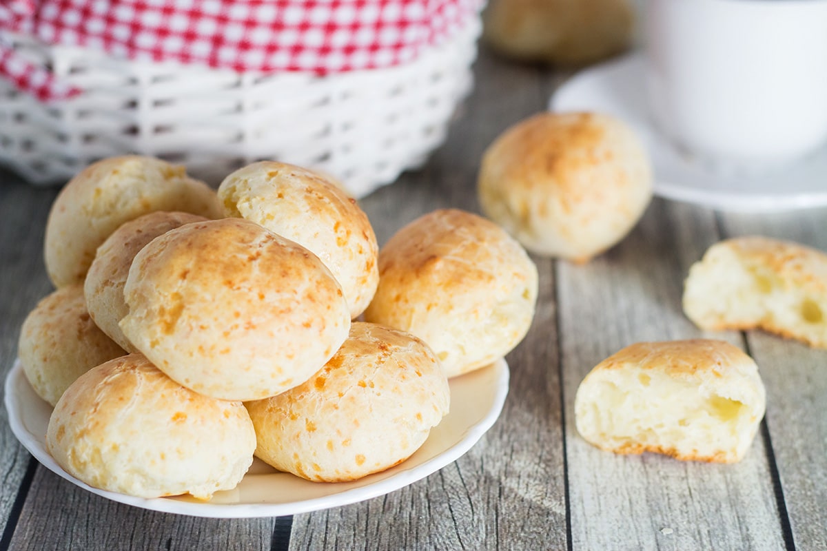 You will love this Pao de Queijo or Brazilian Cheese Bread recipe! The result is crispy outside but soft and chewy inside cheese puffs!