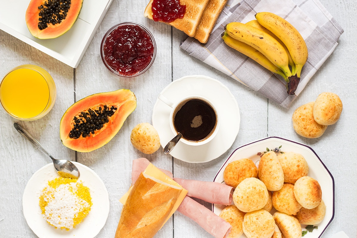 Take a sneak peek at the traditional Brazilian breakfast! It offers coffee, fruit, cheese bread, couscous and other delicious foods!
