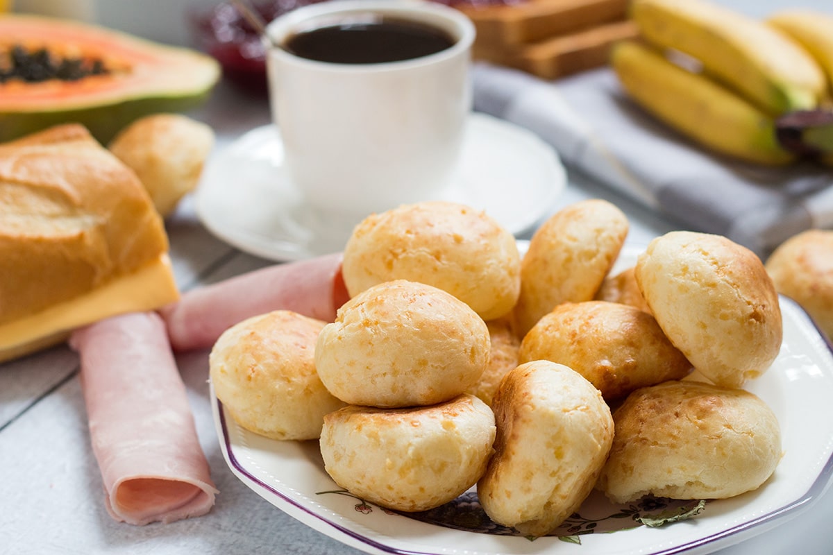 Take a sneak peek at the traditional Brazilian breakfast! It offers coffee, fruit, cheese bread, couscous and other delicious foods! | cookingtheglobe.com