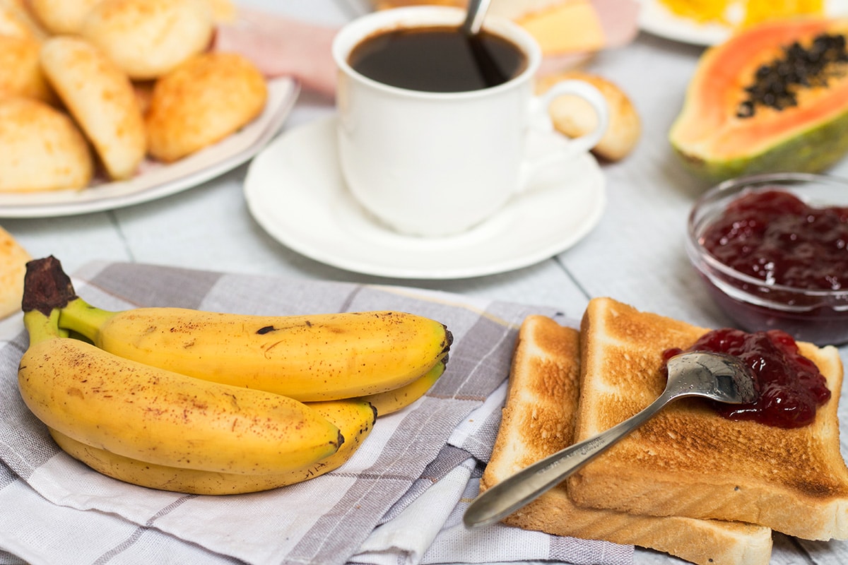 Breakfast Table In Brazil With Breads Cheese Cup Of Coffee And