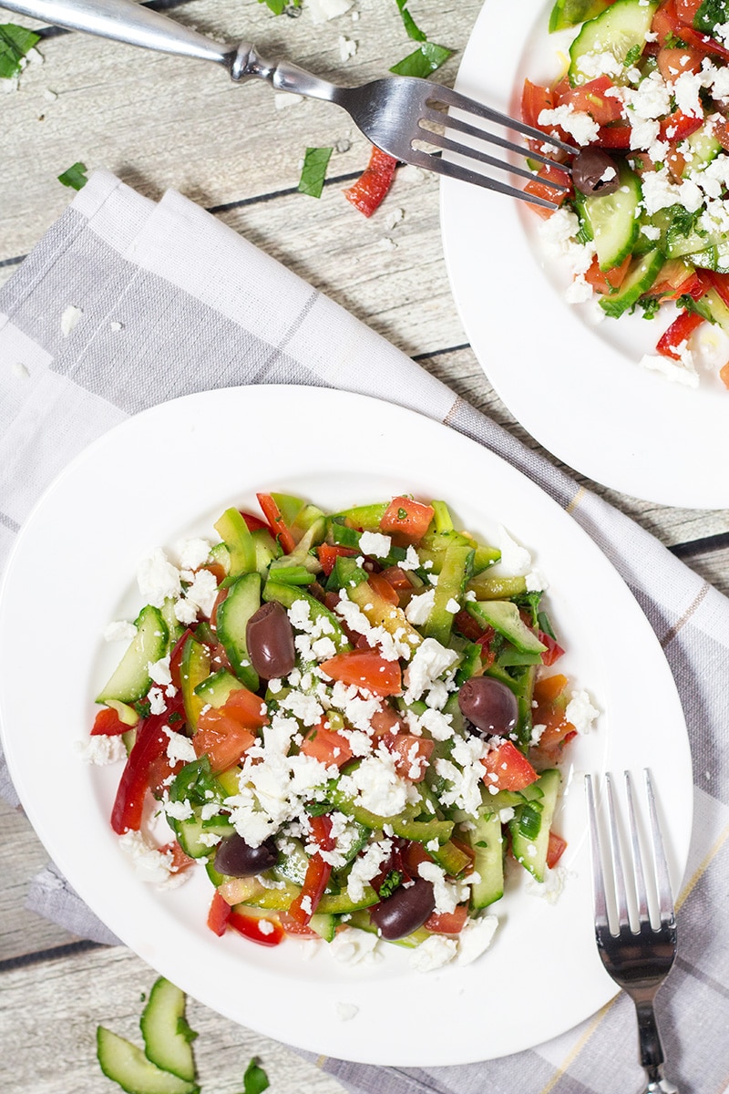 This colorful Bulgarian Shopska Salad is loaded with veggies! Perfect for hot summer days! | cookingtheglobe.com