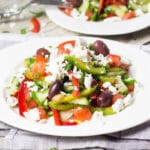 This colorful Bulgarian Shopska Salad is loaded with veggies! Perfect for hot summer days! | cookingtheglobe.com