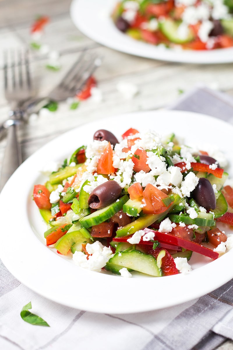 This colorful Bulgarian Shopska Salad is loaded with veggies! Perfect for hot summer days! | cookingtheglobe.com