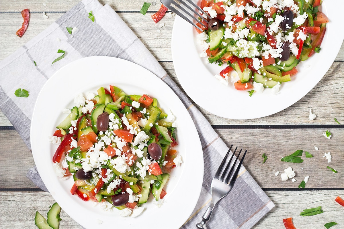 This colorful Bulgarian Shopska Salad is loaded with veggies! Perfect for hot summer days! | cookingtheglobe.com