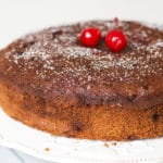 This Jamaican Rum Cake is dark, dense, and filled with rum-soaked dried fruit and Christmassy spices! | cookingtheglobe.com