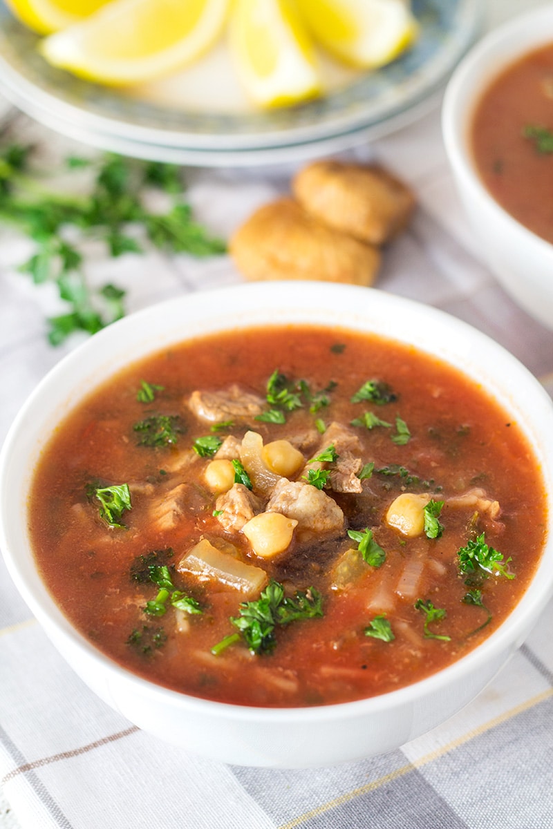 Harira soup comes from Morocco and combines beef, chickpeas, plenty of tomatoes, a few herbs and of course spices! | cookingtheglobe.com