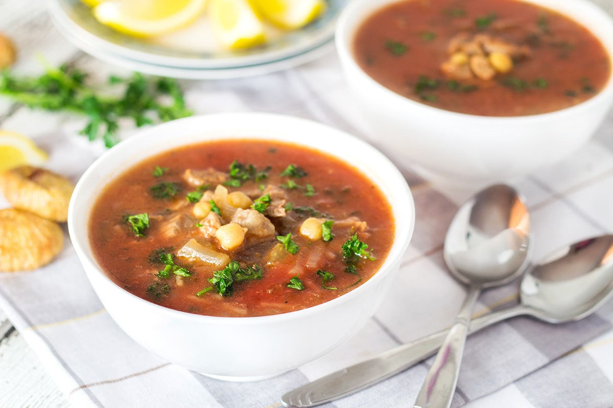 Harira soup comes from Morocco and combines beef, chickpeas, plenty of tomatoes, a few herbs and of course spices! | cookingtheglobe.com