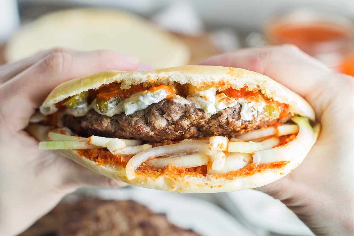 This Serbian burger, called Pljeskavica, will make you forget about all those other burgers from fast food chain places from the very first bite! | cookingtheglobe.com