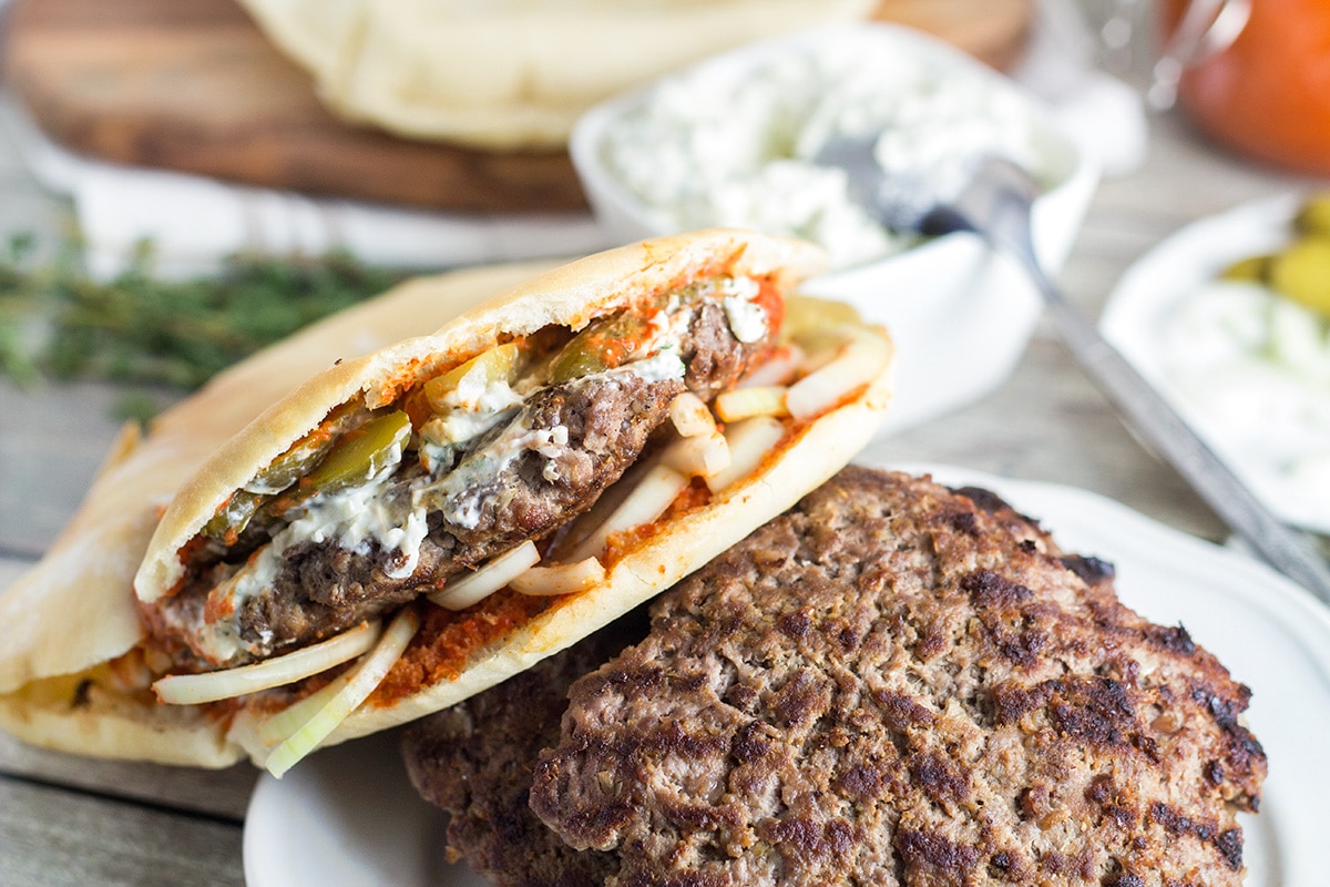 This Serbian burger, called Pljeskavica, will make you forget about all those other burgers from fast food chain places from the very first bite! | cookingtheglobe.com