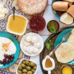 A look at the traditional Moroccan breakfast which features bread, semolina pancakes, fried eggs and the famous mint tea! | cookingtheglobe.com