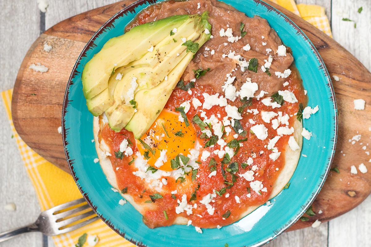 There is nothing better than Mexican traditional Huevos Rancheros in the morning. Try this easy and delicious recipe with homemade salsa!