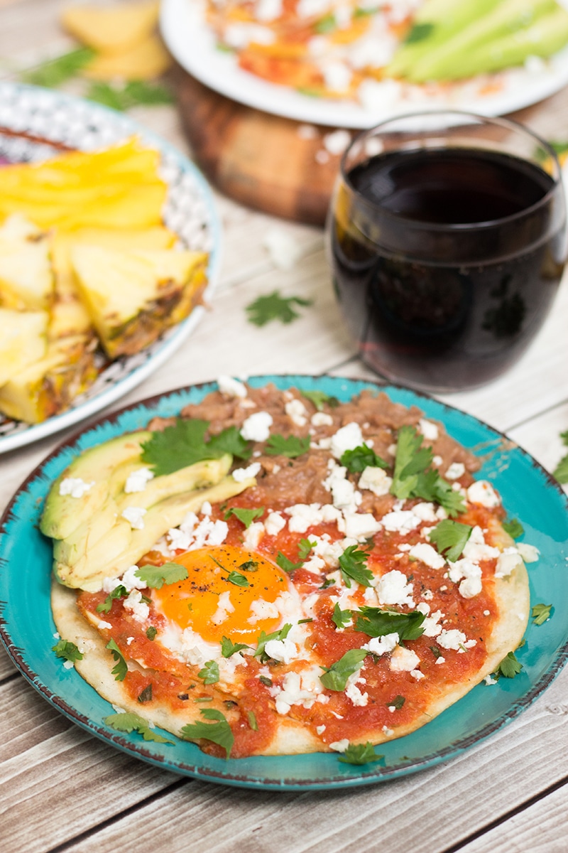 A look at the traditional Mexican breakfast which features spicy fried eggs (Huevos Rancheros), tortilla chips in a sauce (Chilaquiles), sweet bread and the hot corn drink (Atole)!