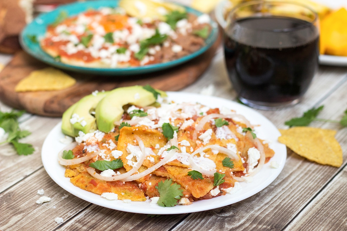 A look at the traditional Mexican breakfast which features spicy fried eggs (Huevos Rancheros), tortilla chips in a sauce (Chilaquiles), sweet bread and the hot corn drink (Atole)!