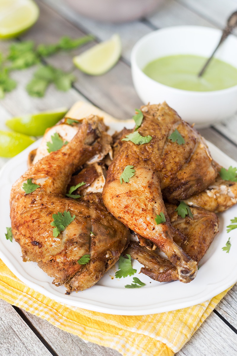 This Peruvian Chicken with a traditional Peruvian green sauce is destined to become one of your favorite chicken recipes ever!