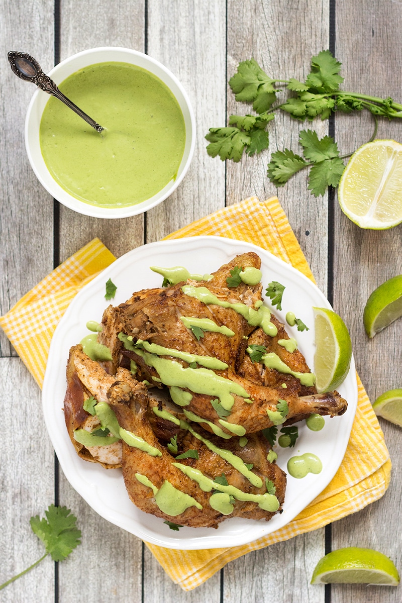 This Peruvian Chicken with a traditional Peruvian green sauce is destined to become one of your favorite chicken recipes ever!