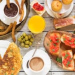 A look at the traditional Spanish breakfast featuring the famous Spanish potato omelette, churros and hot chocolate, and a big variety of delicious sandwiches!