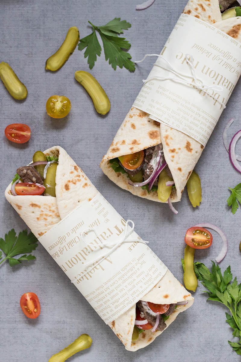 This Lebanese Beef Shawarma has everything you need: the tender meat, veggies, and the amazing tahini sauce. All this goodness wrapped in a pita bread. Perfection!