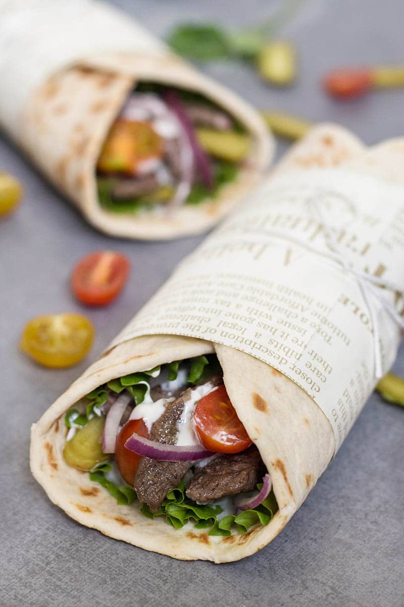 This Lebanese Beef Shawarma has everything you need: the tender meat, veggies, and the amazing tahini sauce. All this goodness wrapped in a pita bread. Perfection!