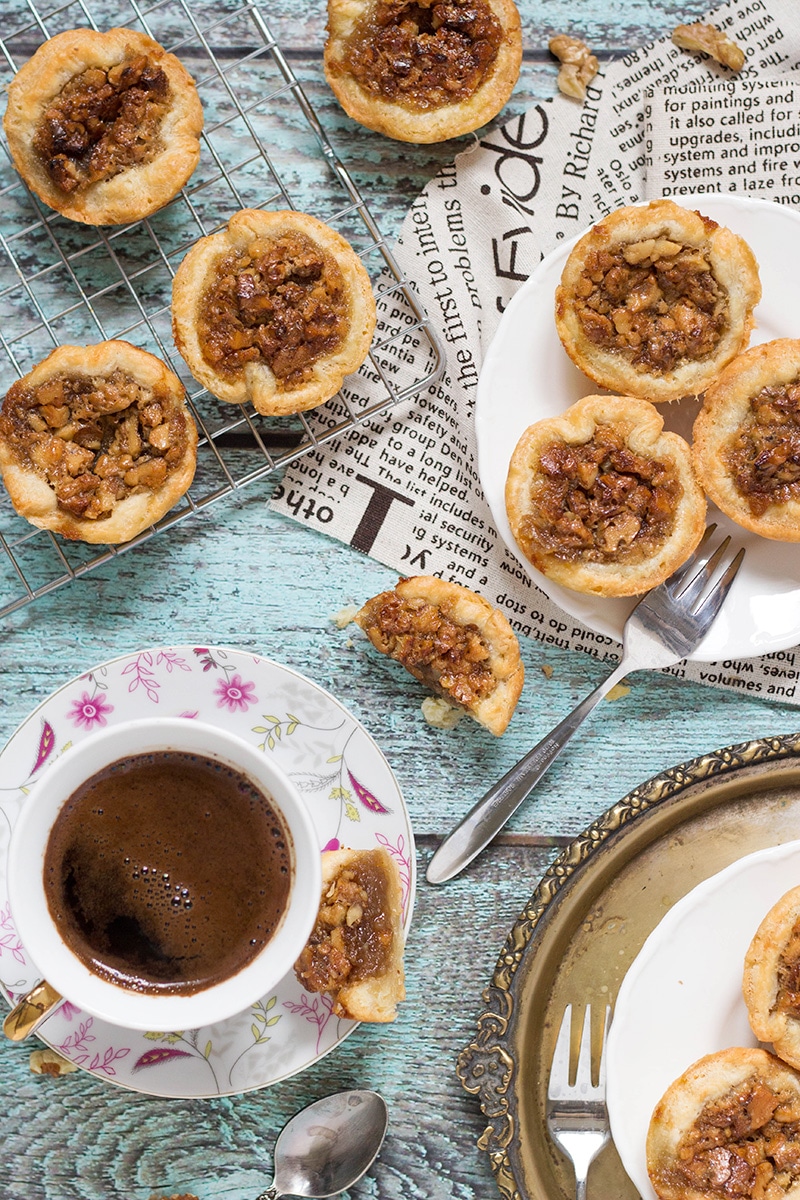 Butter Tarts are the traditional Canadian dessert. These little cute treats are sweet and buttery. One of the best desserts I have ever tried! | cookingtheglobe.com