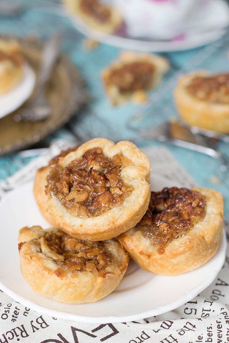 Butter Tarts are the traditional Canadian dessert. These little cute treats are sweet and buttery. One of the best desserts I have ever tried! | cookingtheglobe.com