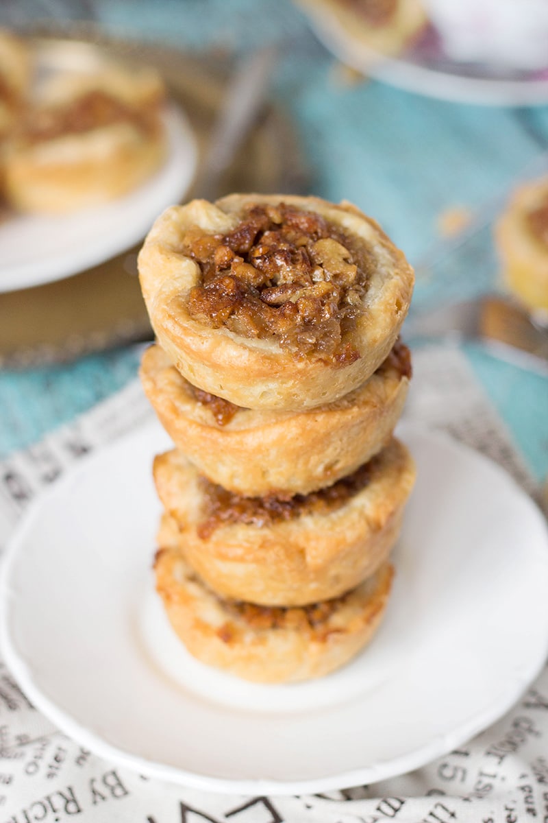 Butter Tarts are the traditional Canadian dessert. These little cute treats are sweet and buttery. One of the best desserts I have ever tried! | cookingtheglobe.com