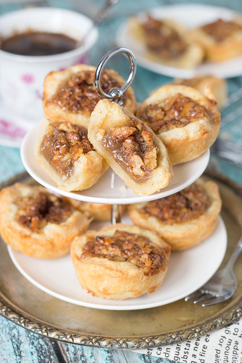 Butter Tarts are the traditional Canadian dessert. These little cute treats are sweet and buttery. One of the best desserts I have ever tried! | cookingtheglobe.com