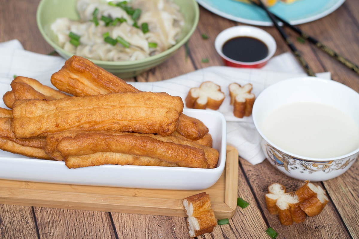 A look at the traditional Chinese breakfast including dumplings, rice porridge, fried bread sticks, and amazing crepes! | cookingtheglobe.com