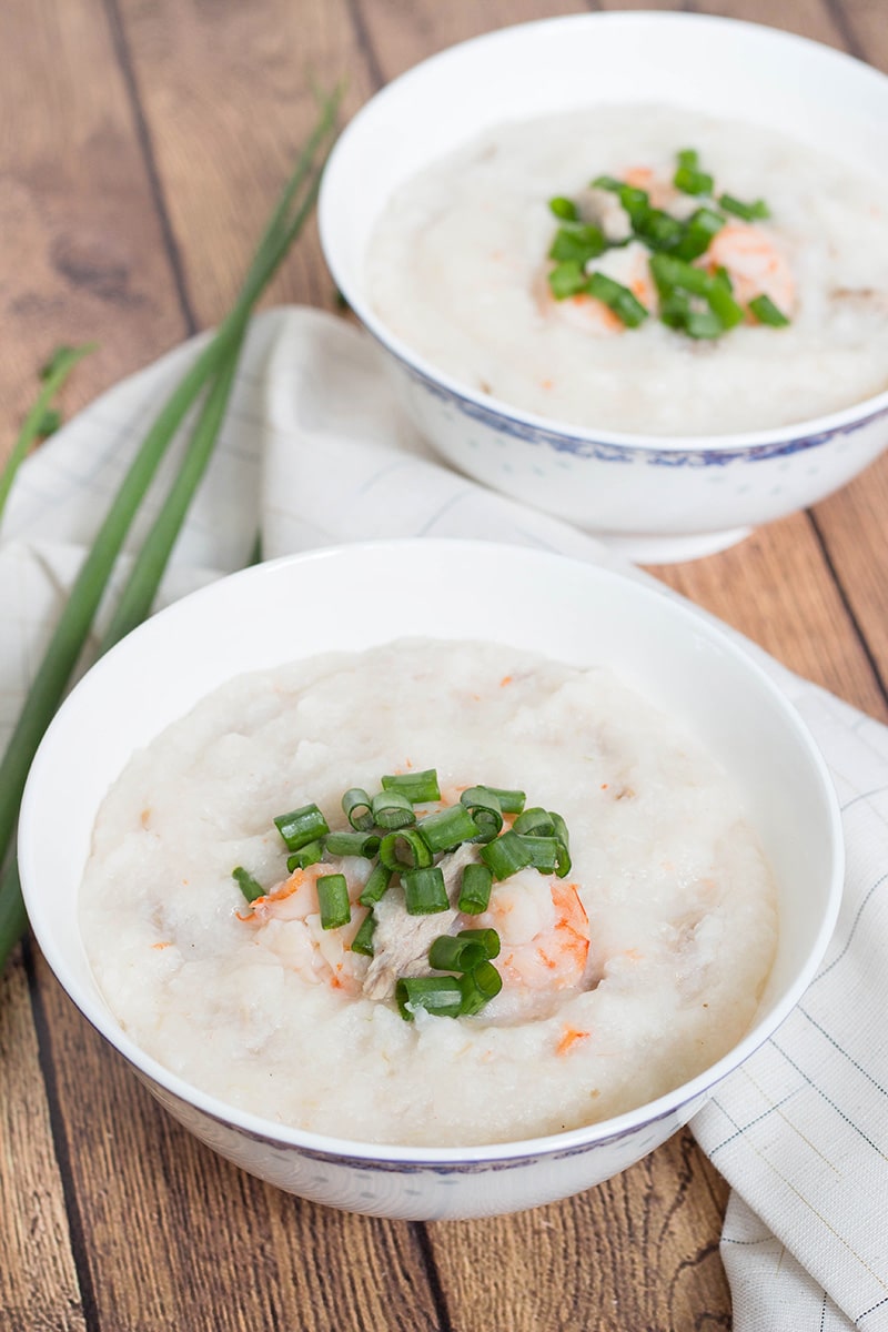 Pork and Shrimp Congee (Jook) is a Chinese breakfast favorite, but is perfect for any meal of the day. This rice porridge is filling, nourishing, and energy boosting! | cookingtheglobe.com