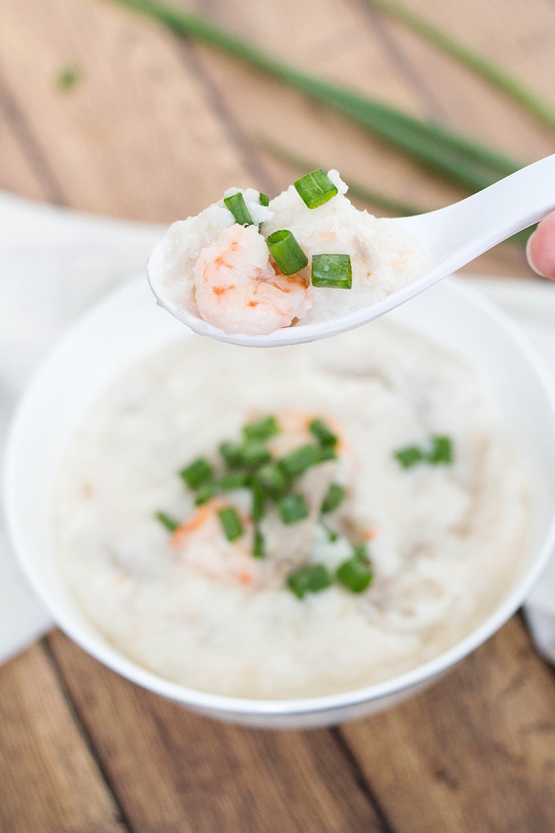 Pork and Shrimp Congee (Jook) is a Chinese breakfast favorite, but is perfect for any meal of the day. This rice porridge is filling, nourishing, and energy boosting! | cookingtheglobe.com