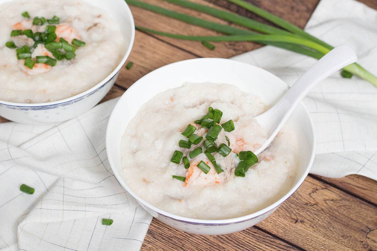 Pork and Shrimp Congee (Jook) is a Chinese breakfast favorite, but is perfect for any meal of the day. This rice porridge is filling, nourishing, and energy boosting! | cookingtheglobe.com