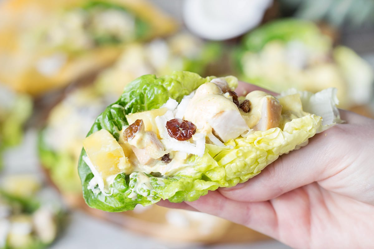 This crazy delicious Curried Chicken Salad comes from the Caribbean, and also features pineapple, coconut, raisins and other goodness! | cookingtheglobe.com