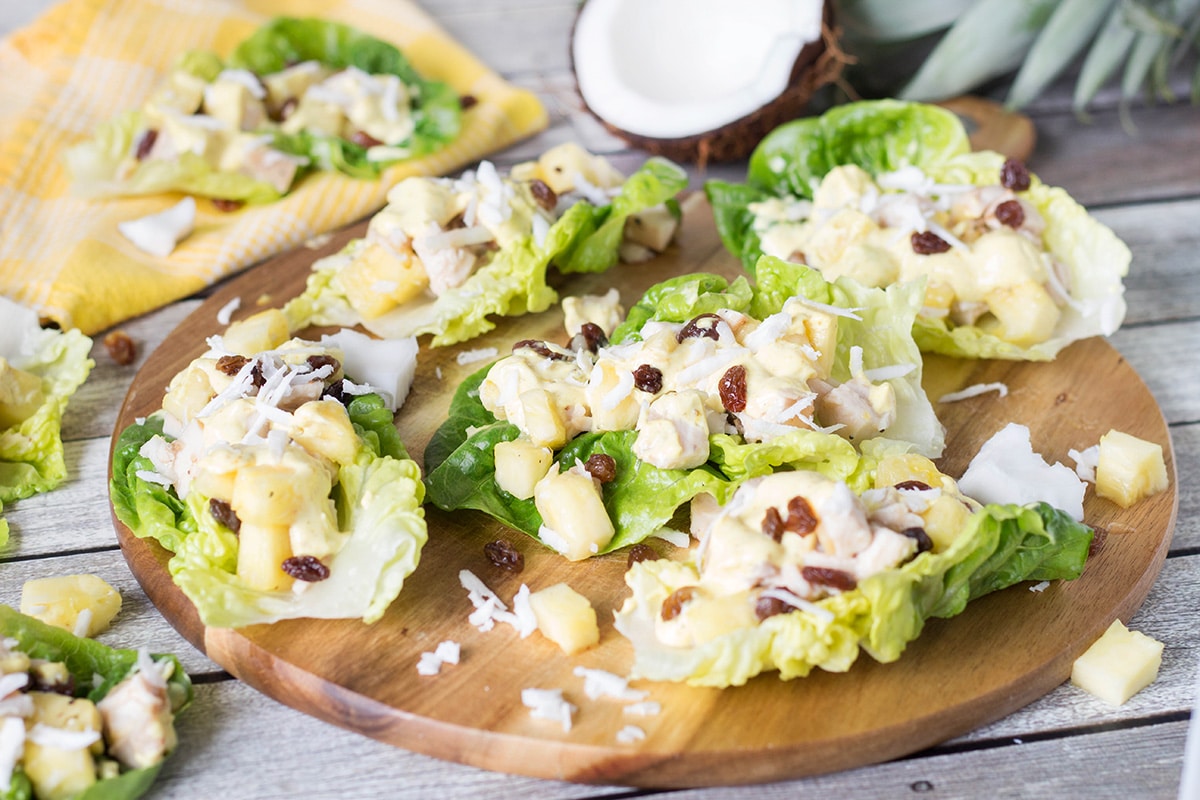 This crazy delicious Curried Chicken Salad comes from the Caribbean, and also features pineapple, coconut, raisins and other goodness! | cookingtheglobe.com