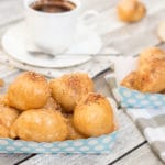 Check out these traditional Greek honey puffs (Loukoumades) sprinkled with cinnamon and walnuts. They are also called Greek donuts. Heaven for your taste buds!