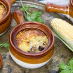 Pastel de Choclo is a famous South American pie, or casserole, stuffed with beef, chicken, eggs, and topped with a delicious corn pudding! | cookingtheglobe.com